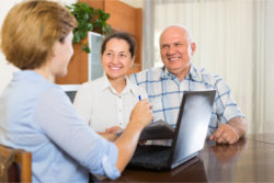 three people talking